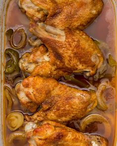 chicken with onions and peppers in a casserole dish