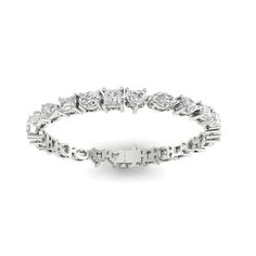 The multi-shaped diamond tennis bracelet is handcrafted in 14K or 18K yellow, rose, or white gold, and round, brilliant-cut white diamonds. A beautiful bracelet with timeless appeal that can be worn anywhere. It makes the perfect gift for yourself or someone you love, because diamonds are always forever. 14K or 18K gold 12.5-13.07 ct diamonds 25 white diamonds D-E-F color diamonds (all colors and grades available upon request) Diamond clarity is VVS-VS Secure insert clasp with safety link for sa White Cubic Zirconia Fine Jewelry Bracelet, White Cubic Zirconia Bracelets Fine Jewelry, White Diamond Baguette Cut Bracelet, White Diamond Bracelet With Diamond Accents Fine Jewelry, White Diamond Bracelet With Diamond Accents, Fine Jewelry White Diamond Bracelet With Accents, White Baguette Cut Diamond Bracelet Fine Jewelry, Dazzling White Diamond Bracelets, Dazzling White Bracelets With Single Cut Diamonds