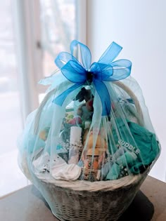 a basket filled with lots of items sitting on top of a table