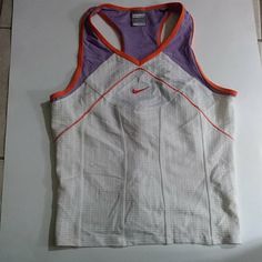 Nice Nike Tank Top In White/Orange/Purple Color, Size M (8/10) In Excellent Conditions (Never Used) Purple Nike Sporty Top, Nike Purple Sporty Tops, Nike Purple Tops For Spring, Nike Sporty Purple Top, Nike Purple Fitted Top, Fitted Nike Purple Tops, Purple Cotton Workout Top, Spring Sports Purple Top, Nike Purple Sleeveless Tops