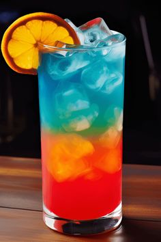 Delicious Tie Dye Cocktail featuring vibrant colors and fruity flavors. Perfect for summer gatherings, this drink combines vodka, blue curacao, and various juices, making it a fun and refreshing choice for anyone.