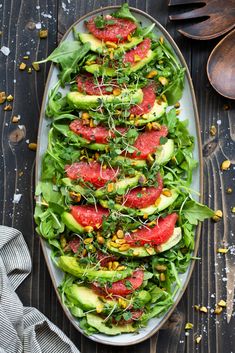 watermelon, avocado and corn salad on a platter