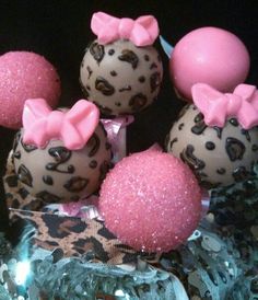 chocolate cake pops decorated with pink and leopard print