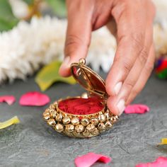 Sindoor is a symbol of fertility and married life. In short, it's the symbol of blissful household life. Also, there are always a lot of expectations with regards to the sindoor box received by the bride at her wedding. It should be attractive so that she can show off the same to guests and well-wishers who visit her after marriage. So, this product is made in designer metal which makes it look highly fashionable, chic, and elegant. Add this to your collection, or gift it to your loved ones on a special occasion to brighten their day. Luxury Meenakari Chandbalis As Gift, Luxury Cutdana Chandbalis As Gift, Luxury Chandbalis As Gift, Cheap Traditional Chandbalis As Gift, Luxury Traditional Chandbalis For Gift, Luxury Fusion Style Chandbalis As Gift, Luxury Chandbalis As Diwali Gift, Housewarming Return Gifts, Fruit Pouches