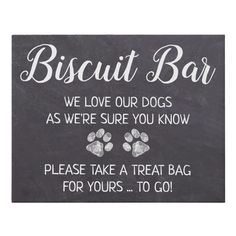 a sign that says biscuit bar, we love our dogs as were sure you know please take a treat bag for yours to go