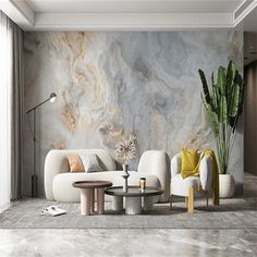 an elegant living room with marble walls and flooring, white sofas and chairs