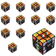 a group of cubes with faces and numbers on them