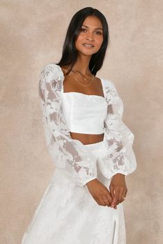 The memories you make in the Lulus Outstanding Perfection White Floral Burnout Two-Piece Maxi Dress will last a lifetime! Airy woven organza, with a floral-like burnout motif throughout, lays atop a white knit liner as it shapes this romantic two-piece bridal dress. A seamed crop top features a straight neckline (with hidden no-slip strips) framed by sheer, balloon-style sleeves with elastic at the shoulders and cuffs. Turn around to show off two functional ties that secure an alluring back cuto