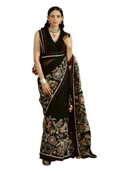 Black saree with aari thread embroidered floral motifs and scalloped border. Comes with padded scalloped border blouse. - Aza Fashions Bollywood Style V-neck Blouse With Resham Embroidery, Designer V-neck Choli With Resham Embroidery, Unstitched V-neck Traditional Wear For Diwali, Semi-stitched Traditional Wear With V-neck, Traditional Semi-stitched V-neck Wear, Semi-stitched Traditional V-neck Wear, Traditional V-neck Blouse With Zari Work, Semi-stitched V-neck Traditional Wear For Diwali, Black Embroidered Saree Fabric