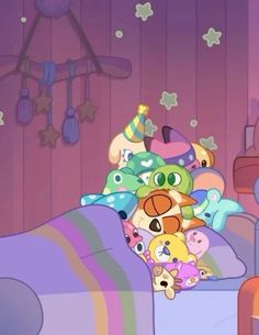 a bunch of stuffed animals sitting on top of a couch in a room with purple walls