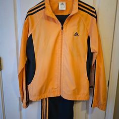 Adidas Jacket/Pant Set Dark Grey & Orange Both Items Areused - Worn Once Just To Try On, So Basically New Jacket Size Large, Pants Size Medium Adidas Set, Large Pants, New Jacket, Grey Adidas, Adidas Tops, Pant Set, Try On, Adidas Women, Adidas Jacket