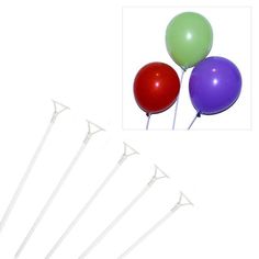 four balloons are on top of each other with white sticks sticking out of the bottom