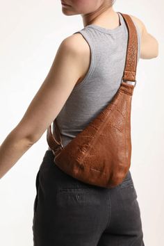 Our Amadeus Sling made of fine Italian leather brings modern sophistication to a trend-smart belt bag perfect for keeping your hands free and essentials organized and offers versatile utility. Modern Soft Leather Crossbody Chest Bag, Modern Soft Leather Chest Bag For Daily Use, Versatile Leather Chest Bag For On-the-go, Modern Soft Leather Shoulder Chest Bag, Versatile Leather Chest Bag With Removable Pouch, Modern Soft Leather Chest Shoulder Bag, Modern Leather Chest Bag With Detachable Strap, Modern Brown Soft Leather Belt Bag, Modern Leather Crossbody Chest Bag