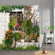 a shower curtain with flowers and plants on it