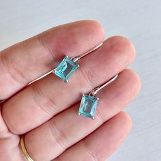 Aquamarine Earrings March Birthstone Aqua Blue Emerald Cut - Etsy Blue Rectangular Earrings With Ear Wire, Blue Rectangular Earrings, Rectangular Blue Earrings For Anniversary, Oblong Jewelry With Matching Earrings For Gifts, Oblong Jewelry Set With Matching Earrings As Gift, Jewelry Set With Matching Earrings As A Gift, Blue Rectangular Gemstone Earrings, Emerald Cut Earrings, Quartz Properties