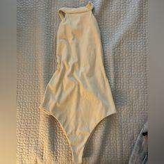 Never Worn Xs Chic Beige Stretch Swimwear, Cream Fitted Swimwear For Spring, Fitted Cream Swimwear For Spring, Cream Fitted Swimwear For Party, Fitted Cream Swimwear For Party, Beige Sleeveless Swimwear For Spring, Beige Party Swimwear For Spring, Chic Fitted Swimwear For Day Out, Chic Solid Swimwear For Spring