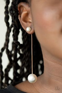 Attached to a sleek gold chain, an oversized white pearl delicately swings from the bottom of a classic white pearl, adding a timeless twist to the elegant display. Earring attaches to a standard post fitting. Sold as one pair of post earrings. P5PO-GDXX-096XX Bedazzled Jewelry, Paparazzi Accessories Jewelry, Gold Jacket, White Pearl Earring, Earring Jackets, 25 21, Gold Pearl Earrings, Paparazzi Accessories, White Rhinestone