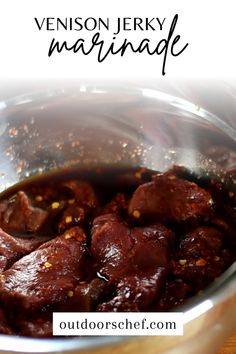 a close up of food in a pot on a table with text overlay that reads, venison jerry marinade