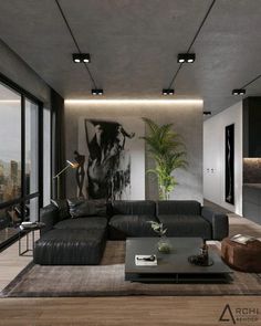 a living room filled with furniture and a large painting on the wall above it's windows