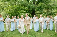 a bride and groom with their bridal party