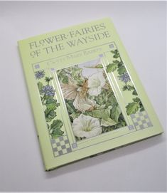 the book flower fairies of the wayside is on display