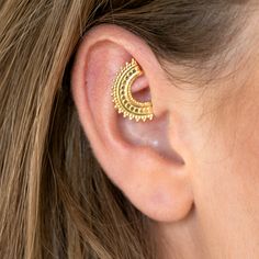 "Unique Rook Earring, Made of 14k Solid Yellow/Rose Gold, Tribal Indian Ethnic Style, 16g-20g, Fits also Nostril, Septum, Cartilage, Helix, Daith, Handmade Piercing Jewelry. Ear piercing combines perfectly your personal touch with an expression of style & fashion. This ring is made of high-quality 14k solid yellow or rose gold, lead-free & nickel-free. The design is perfect for a variety of piercing locations: Rook/ Daith / Nostril/ Cartilage / Tragus / Helix / Septum Spice up your jewelry colle Unique Gold Pierced Ear Climbers, Unique Gold Cartilage Earrings With Ear Wire, Yellow Gold Brass Ear Cuff For Pierced Ears, Pierced Yellow Gold Brass Ear Cuff, Gold Cartilage Earrings With Ear Wire For Festival, Gold Single Ear Cuff For Festivals, Pierced Yellow Gold Brass Cartilage Earrings, Gold Internally Threaded Plug Earrings For Festivals, Gold Crescent Cartilage Earrings