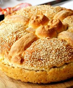 a freshly baked bread with sesame seeds on top