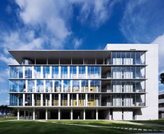 a large white building with lots of windows