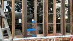 the windows are being boarded up and ready to be installed