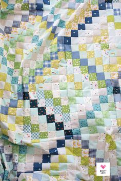 a close up of a patchwork quilt