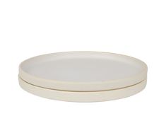 two white plates sitting on top of each other