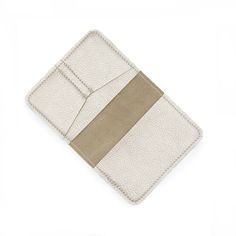 Champagne -Metallic Calling all world travelers! This passport holder is fashioned from soft leather and designed with two card slots for easy access to your travel essentials while keeping your passport safe and secure. Make it shine with custom gold foil monogramming. High quality leather Two inner slip pockets Dimensions 5.5"L, 5.25"W Rectangular Trifold Wallet With Card Slots For Travel, Beige Card Holder With Interior Slots For Daily Use, Gold Leather Card Holder With Interior Slots, Beige Rfid Blocking Card Holder For Everyday, Everyday Beige Rfid Blocking Card Holder, Travel Trifold Card Holder With Interior Slots, Trifold Card Holder With Interior Slots For Travel, Trifold Travel Card Holder With Interior Slots, Gold Trifold Wallet With Card Slots For Everyday Use