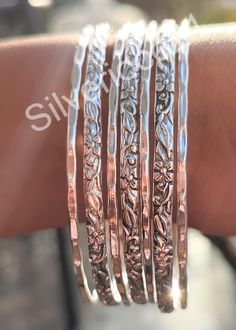 Set of 7 Bangles, 925 Sterling Silver Stacking Bangles For Women, Semanario, Stacking Bracelets, 7 Day Bangles, Half Round Bangles, Gifts Style Bangle/Bracelet Material : Silver  Bracelet Size Inches Circumference/Diameter   7 / 2.23 7.5 / 2.39 8 / 2.55 8.5 / 2.71 9 / 2.87 9.5 / 3 They are plain and simple and yet so elegant and shiny! We make them with a base of stainless steel so they hold up well with daily wear and rough use. These are WATERPROOF *Nickel and Lead-free Sizing: Choose the size Bohemian Silver Personalized Bracelets, Spiritual Silver Bangle For Anniversary, Silver Spiritual Bracelets For Anniversary, Stacking Bangles, Bangles For Women, Stacking Bracelets, Stacked Bangles, Bracelet Stack, Bracelet Sizes