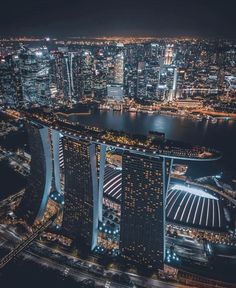 an aerial view of a city at night