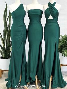 three green bridesmaid dresses on mannequins in front of a potted plant