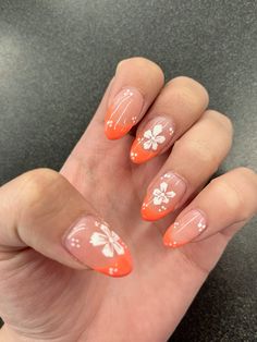 Summer Nails Flower French Tip, Orange French Tip Nails With Flowers, Orange Nails With White Flowers, Orange French Tip With Flowers, Hubiskis Flower Nails, Plumeria Flower Nails, Orange Nails Flowers, Nails Real Flowers, Orange Blossom Nails