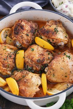 chicken with peaches and herbs in a pan