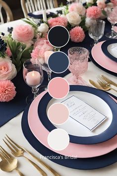 the table is set with blue, pink and white place settings for an elegant dinner