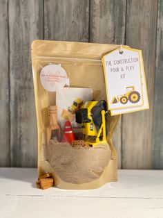 a construction themed play set in a bag