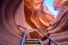 stairs lead up to the bottom of a slot in antelope's canyon