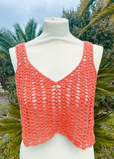 Coral crochet crop top. Breast circumference: 90 cm Bust Size: 90cm/35in Slightly elastic Slight Stretch 100% recycled cotton Made In Italy Hand wash only 😊 Ready to ship. Handmade with 💛 Crochet Lace V-neck Crop Top For Summer, Summer V-neck Crochet Crop Top, Crochet Cotton Tank Top For Beach, Cotton Crochet Tank Top For Beach, Crochet Crop Top For Beach, Vacation Cotton Crochet Top With Open Knit, Crochet Crop Top For The Beach, Vacation Cotton Open Knit Crochet Top, Cotton Crochet Lace Top For Beach Season