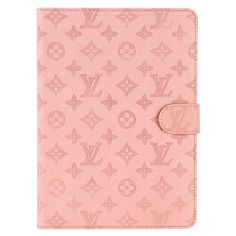 the pink louis vuitton ipad case is open and has an embellishment on it