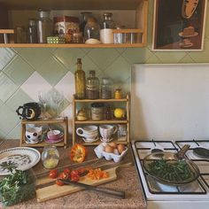 the kitchen counter is cluttered with food and cooking utensils, such as vegetables