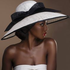 "An Audrey Hepburn inspired hat. Beautifully hand made in white sinamay and trimmed with a big black sinamay bow and black sinamay edging.  The hat will fit headsize 22.5\". The brim size is 9\" and the height of the crown is 4\" This particular hat is ready to ship immediately.   For different colour variations and measurements I will be able to ship in 14 days Thanks for looking 😊" Audrey Hepburn Wedding, Stylish Womens Hats, Audrey Hepburn Inspired, Derby Outfits, Occasion Hats, Ascot Hats, Audrey Hepburn Style, Hepburn Style, Wedding Hat