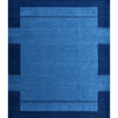 a blue area rug with horizontal stripes on the bottom and diagonals at the top