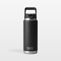 the yeti stainless steel water bottle is black and has a handle for carrying it