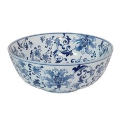 a blue and white bowl sitting on top of a table