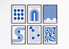 four blue and white posters with the letter s in different styles on them, hanging on a wall