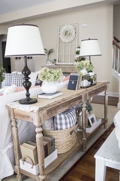 a living room filled with furniture and decor