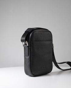 This timeless men’s crossbody bag maintains a classic shape that never goes out of style. Designed with a long strap, it can be worn comfortably as a shoulder or crossbody bag, perfect for when you’re on the move. The bag boasts a discreet and minimalist design, made from durable genuine leather, featuring a reliable YKK metal zipper from Japan, waterproof lining, and premium metal hardware. Size: 8.3 x 6.3 x 1.6 inches. Men’s Shoulder Bag, Luxury Business Chest Bag Crossbody, Luxury Business Chest Bag With Adjustable Strap, Modern Bags With Detachable Strap For Everyday, Modern Everyday Bag With Detachable Strap, Classic Chest Bag For Daily Use, Classic Rectangular Chest Bag For Travel, Business Satchel With Mobile Phone Bag As Shoulder Bag, Business Chest Bag With Cell Phone Pocket